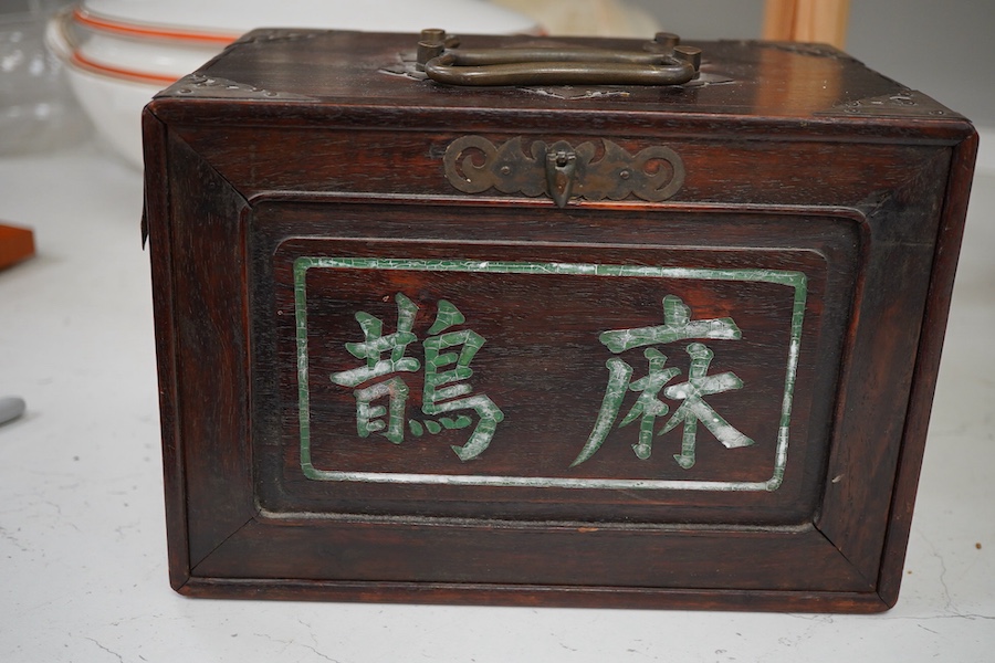 A Chinese bone and bamboo Mah-Jong set, 24cm wide